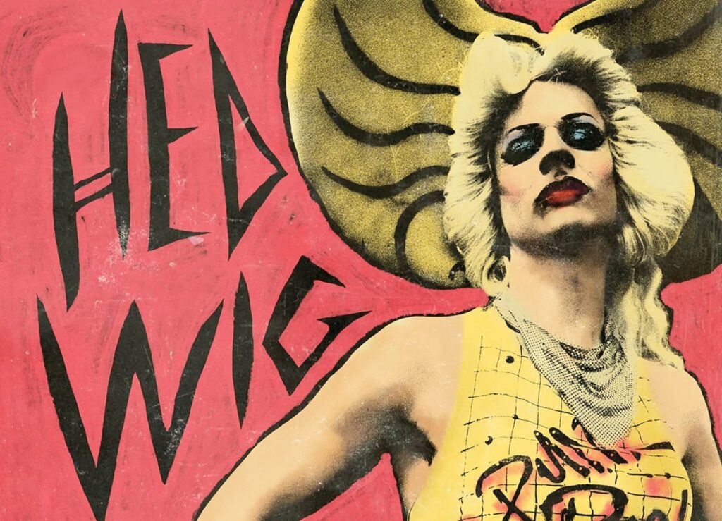 Promotional image for the film Hedwig and the Angry Inch. A posterized and highly stylized image of Hedwig in front of a red background and next to the name Hedwig in a stylized script.